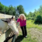 A Girl and Her Horse in the Morning Light