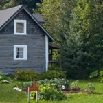 Vintage homesteader cabin in wide open field