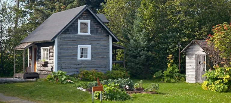 Vintage homesteader cabin in wide open field