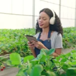 Female farmer with headphones